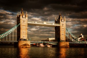 Tower Bridge in London, the UK. Dramatic stormy and rainy clouds